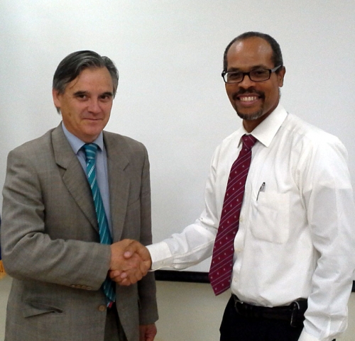 Mr. Eugenio Pössel, Chief Horizontal, Cooperation Department, South-South Program, Chilean Cooperation Development Agency (AGCID) (left) with CRFM Executive Director, Milton Haughton
